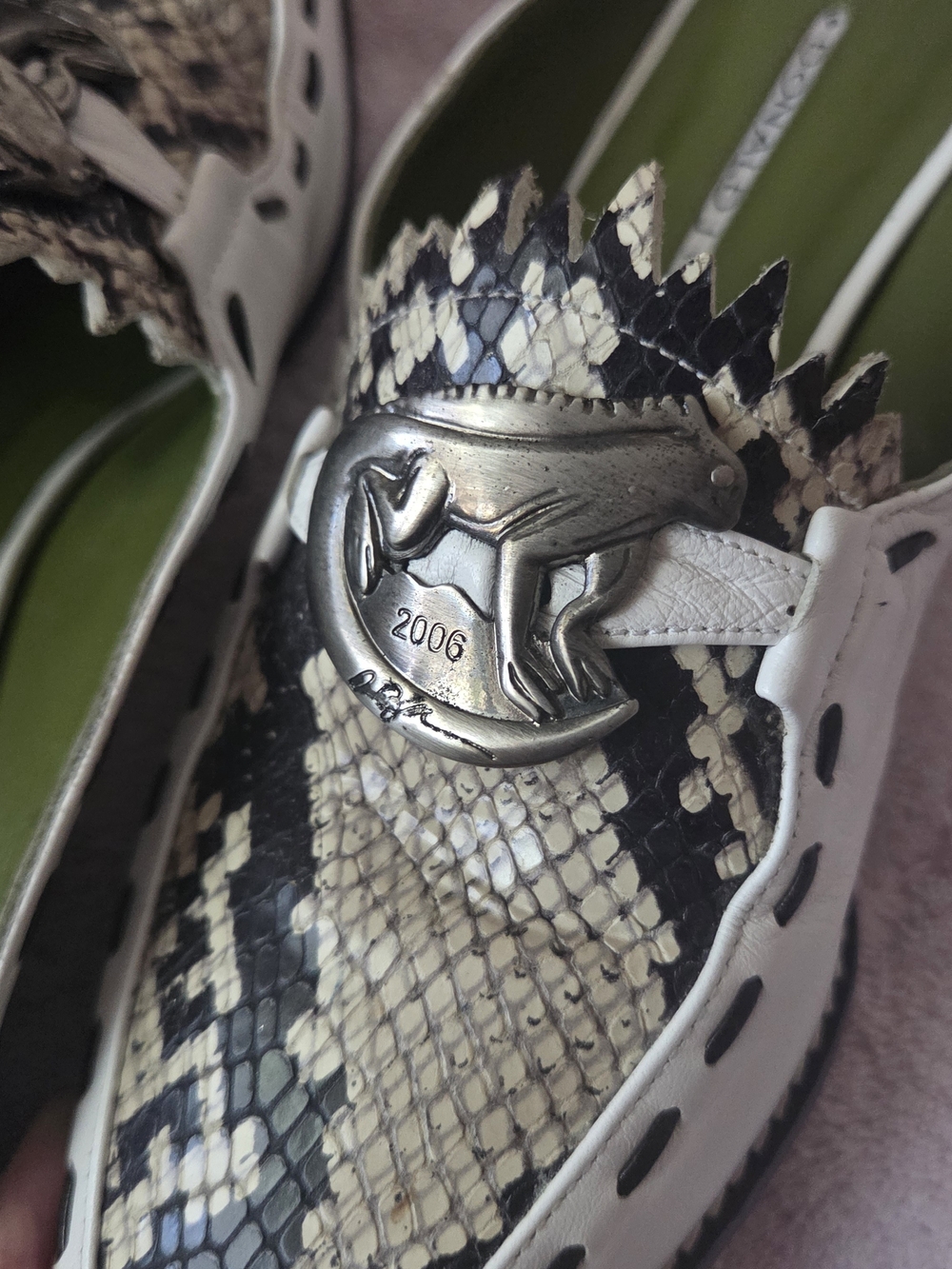 Snake-Print Slip-On Mules with Silver Horse Medallion